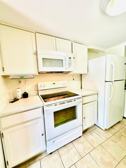 Microwave and Range - 4950 W Brigantine Ct