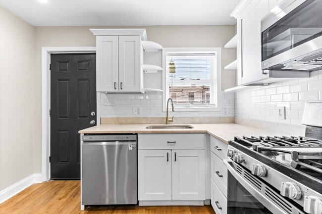 Building Photo - Parkside Haven: Contemporary 2-Bedroom Row Home Near Patterson Park