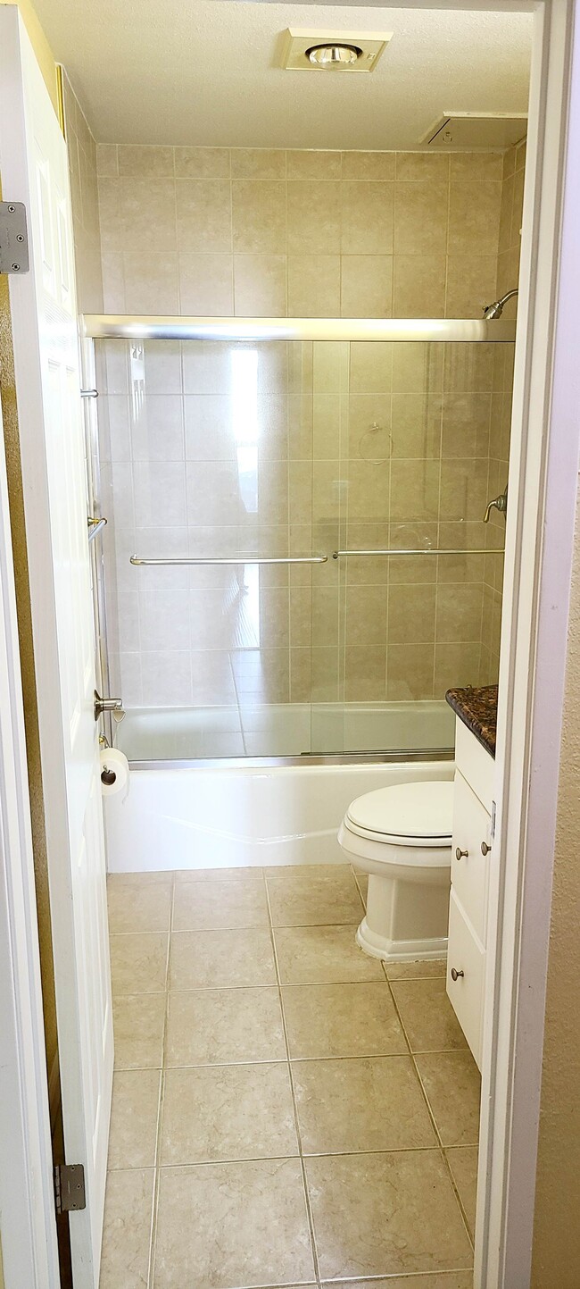 Second bathroom across the hallway from the second bedroom. - 466 Crescent St