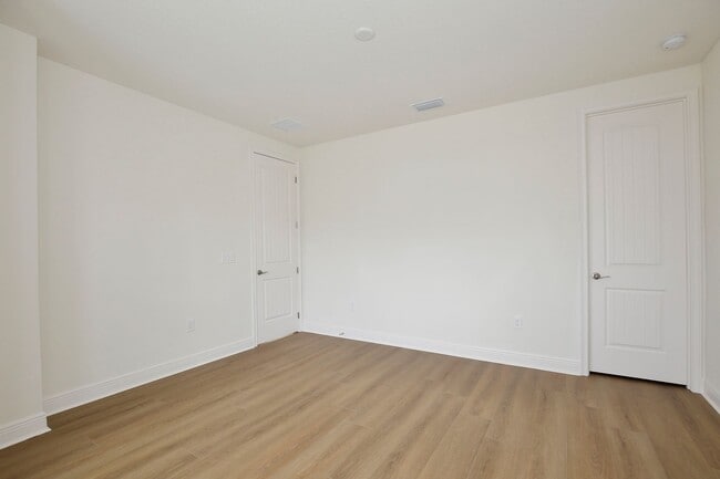 Building Photo - Gorgeous 4/3 Residence with a Private Back Lanai and a 2 Car Garage in the Delightful Laureate Pa...