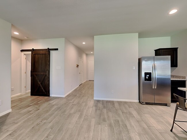 Building Photo - Chapel Creek Beauty with Designer Kitchen, Spacious Layout & Private Backyard Retreat!