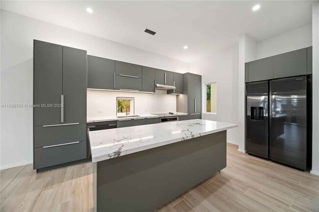 Building Photo - Northwest 9th Court, Miami, FL 33127 - 5 B...