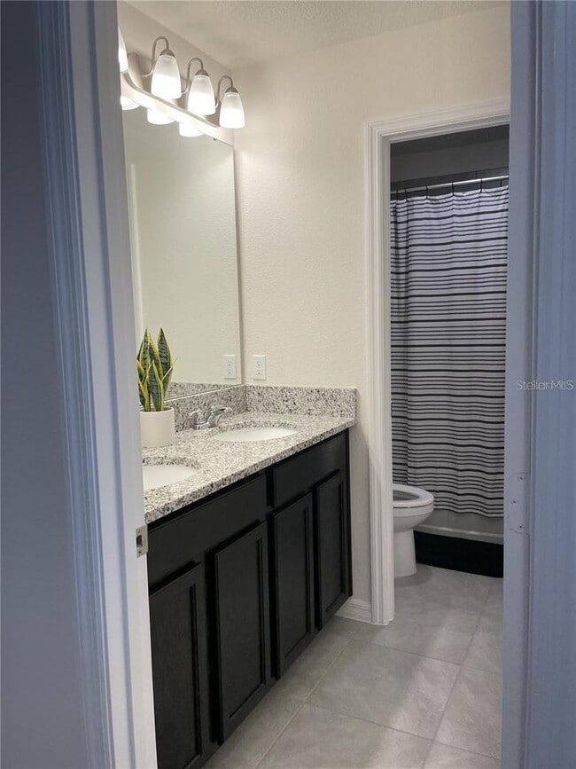 Building Photo - Like New Spacious Home near Lake Nona