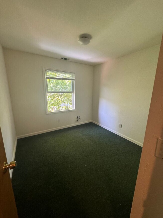 Building Photo - COMING SOON-Spacious 4 bedroom with 3 full bathrooms. Well maintained, private 4-plex with large ...