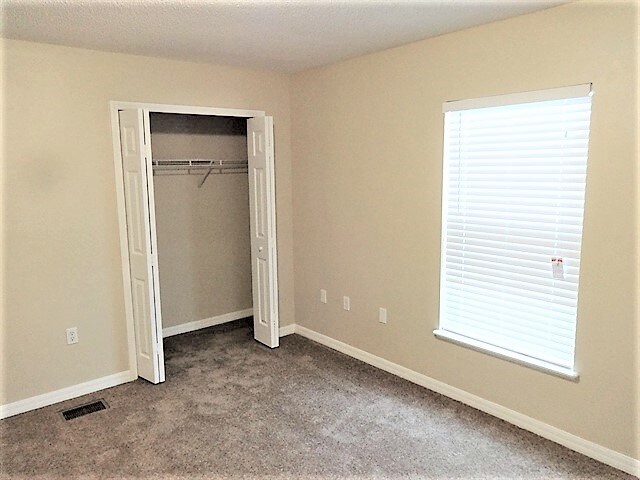 Building Photo - 6686 Gentle Oaks Dr E
