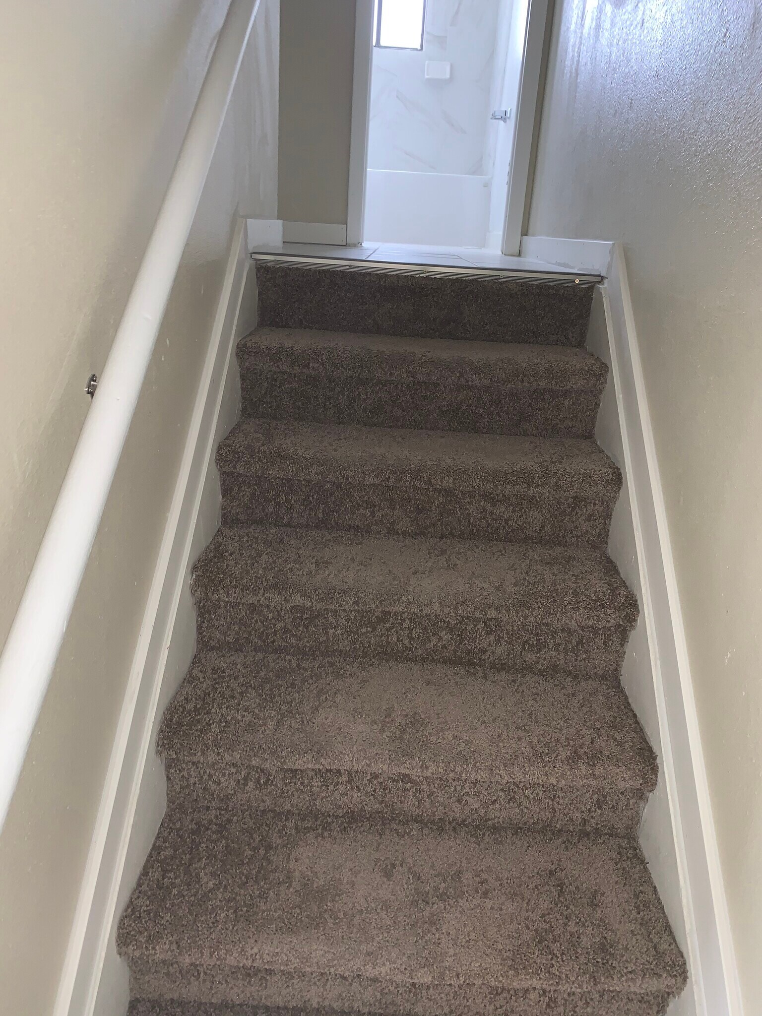 Carpet replaced with by Al planking - 329 S Murray Blvd