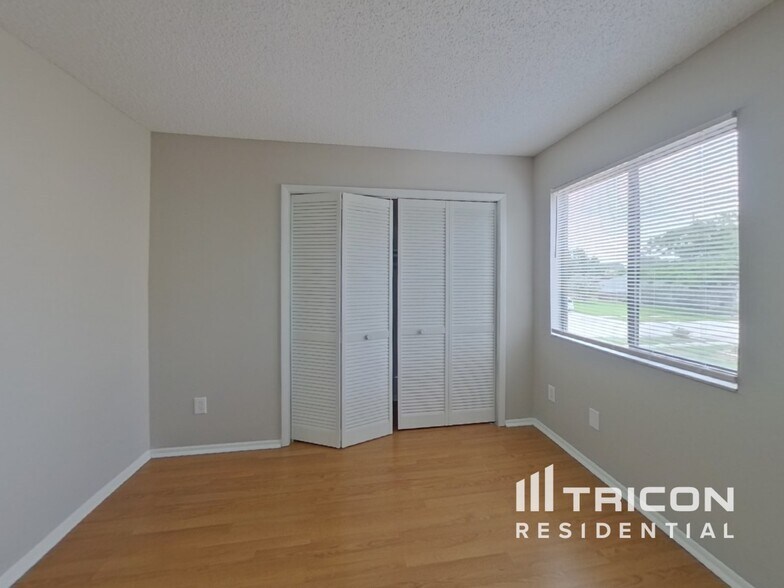 Building Photo - 7914 Tumblestone Dr