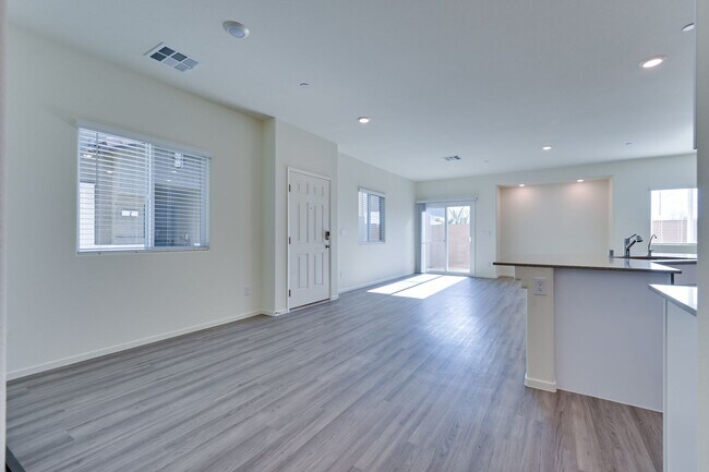 Building Photo - NW 3 Bedroom Townhouse!! Gated Community Pool!! 2 Car Garage!!! No Carpet downstairs.