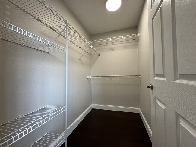 Building Photo - Oviedo 2/2 Condo with Tile & LVP Flooring, Updated Baths, New Paint & Appliances!