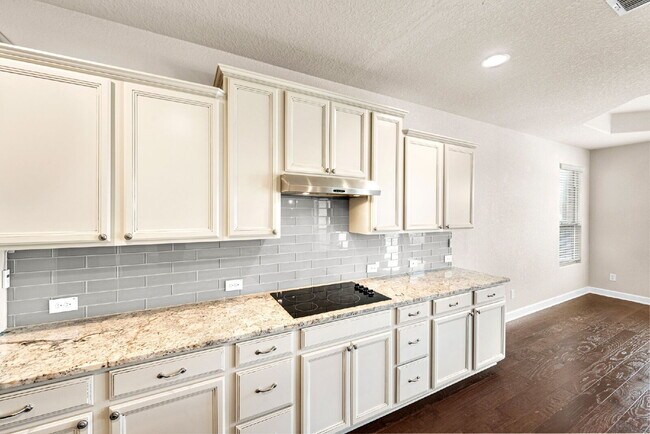 Building Photo - No Rear Neighbors, 3 Car Garage, a Chef's Kitchen, and Room for Everyone