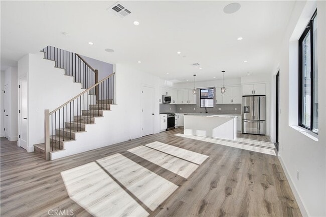 Building Photo - 13461 Bradley Ave