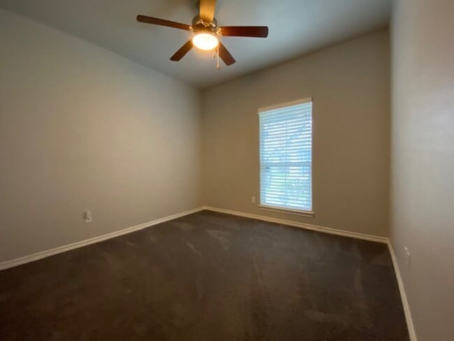 Building Photo - WELCOME TO YOUR CHARMING HOME AT THE COTTA...
