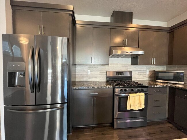 Building Photo - Three-Level Modern Living with Open Floor ...