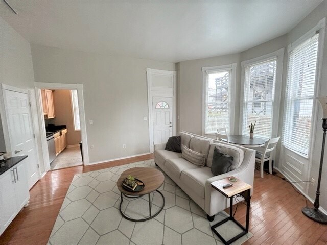 Living room view from stairs - 5975 Alder St