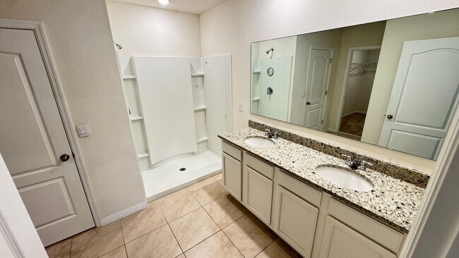 Building Photo - Available NOW! Spacious 4BD/2BA Haven in Villages at Harmony – Your Dream Home Awaits! WASHER & D...