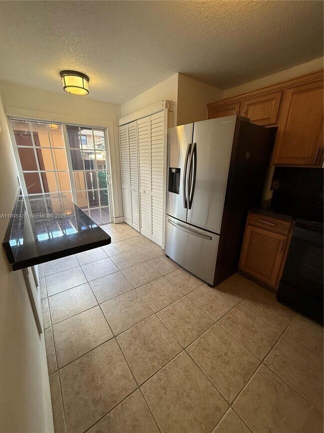 Building Photo - 9986 Royal Palm Blvd