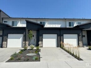 Building Photo - Super cute Row Home with 1 car garage 2 be...