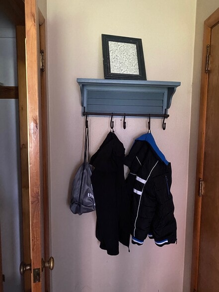 coat closet and rack area - 717 N Highland Ave