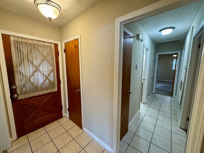 Building Photo - Check Out This 3 Bedroom / 2 Bathroom BRIC...