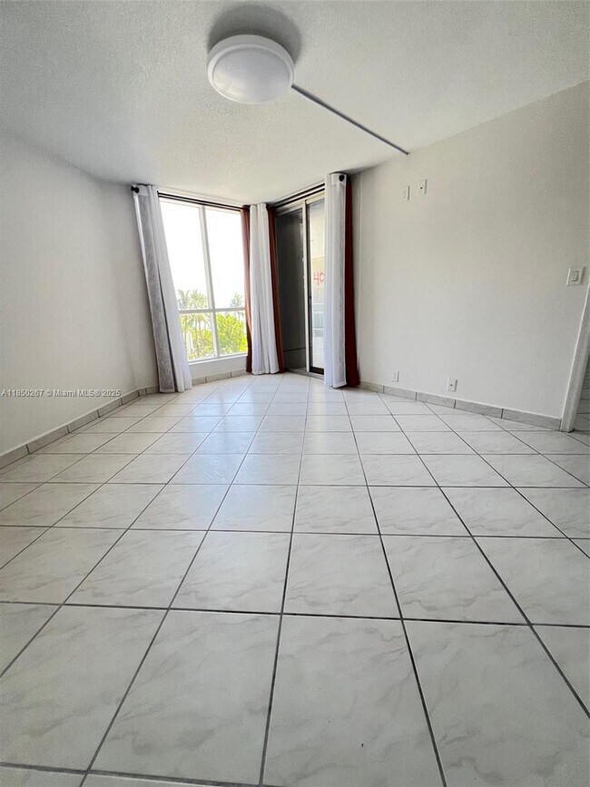 Building Photo - 6767 Collins Ave