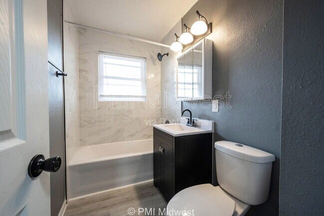 Building Photo - 6064 E 16th St