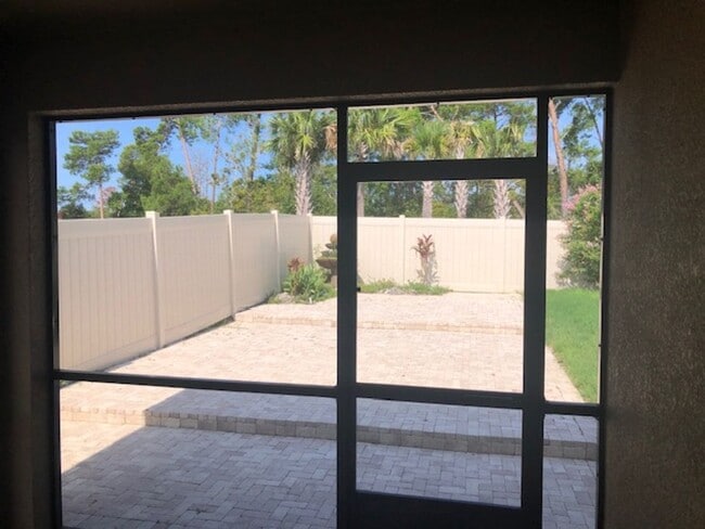 Building Photo - 4/2 with great FENCED in yard and upgraded!