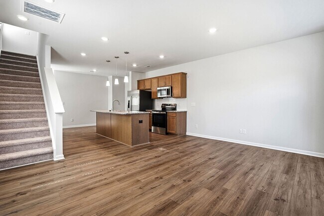 Building Photo - BRAND NEW TOWNHOME-9 FOOT CEILINGS-TWO CAR GARAGE-POOL COMMUNITY