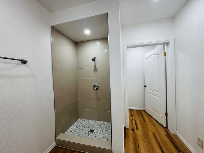Building Photo - Spacious & Newly Updated 1-Bedroom ADU in Gated Woodcrest Property with Parking & Laundry