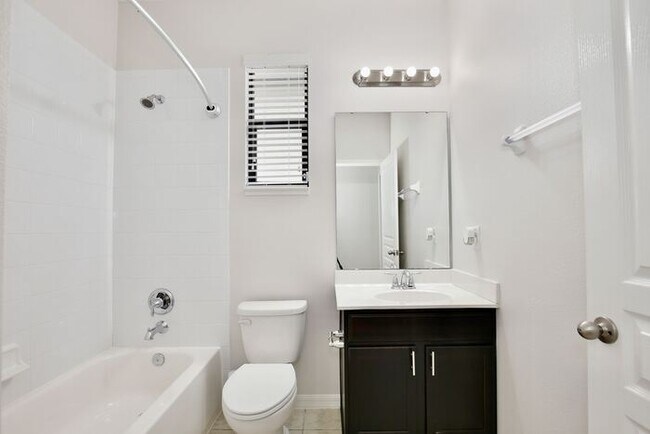 Building Photo - Stylish 4/3 Home with Covered Patio & Gara...