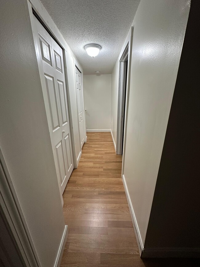 basement hallway - 12 Strawberry Hill Rd