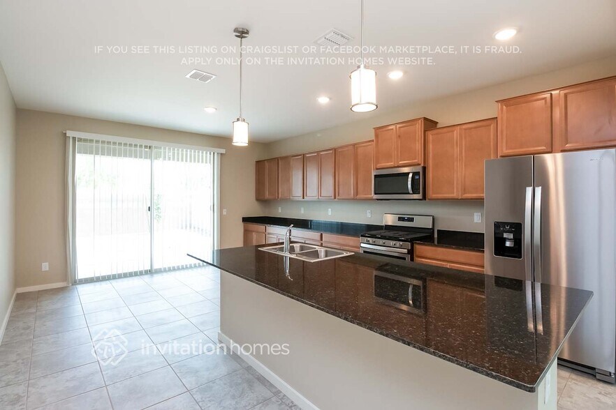 Building Photo - 33987 N Desert Star Dr