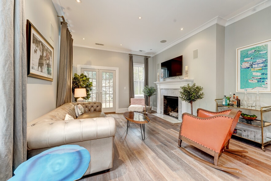 Wood-burning fireplace & exit to Patio! - 1237 29th St NW