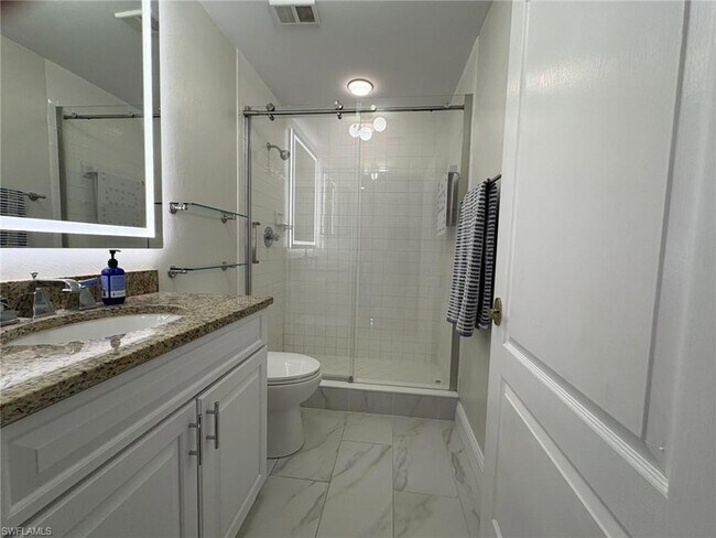 Building Photo - 7040 Pelican Bay Blvd