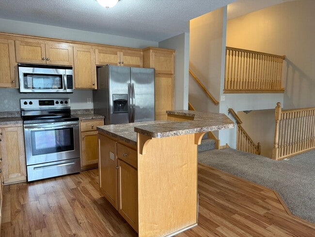 Building Photo - Spacious 3BR / 3BA Townhome with 2-Car Garage – Available Mid-March!