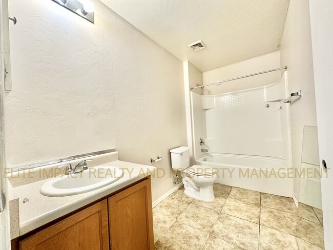 Building Photo - 5210 E Desert Straw Ln