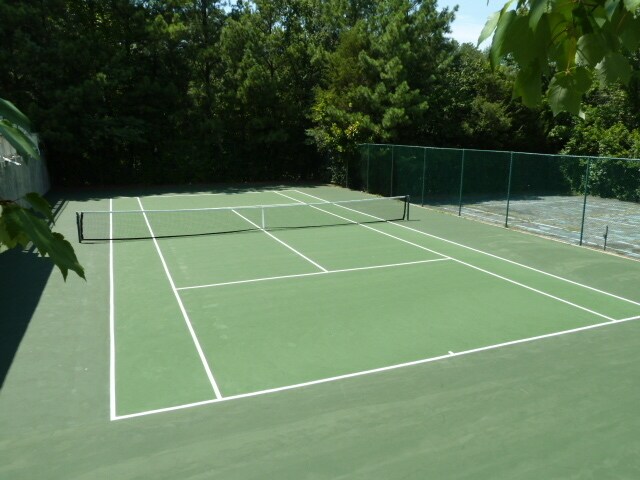 Building Photo - Updated, spacious 4br 2ba condo within wal...