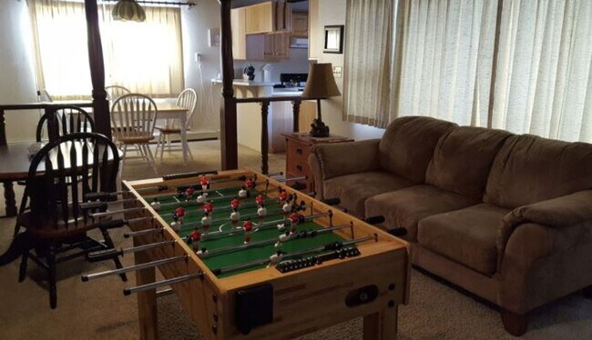 Building Photo - Unique open design,wood beams in all rooms-Very cheery and cozy. Newly remodeled, and newly furni...