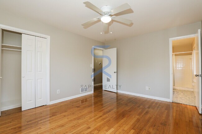 Building Photo - Move in before February 28th and choose your reward: a $250 Amazon Gift Card or a 55" Smart TV!