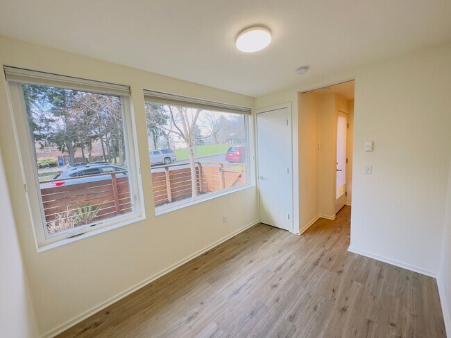 Building Photo - 3 Bedroom Central District Townhome w/ Garage, AC & Rooftop Deck