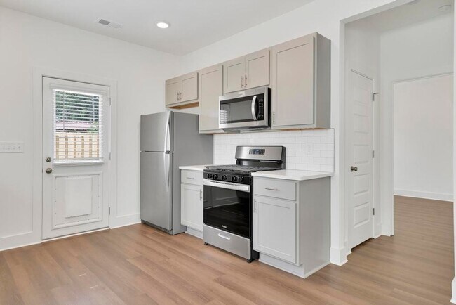 Building Photo - One Level Home with Garage and Fenced Back...