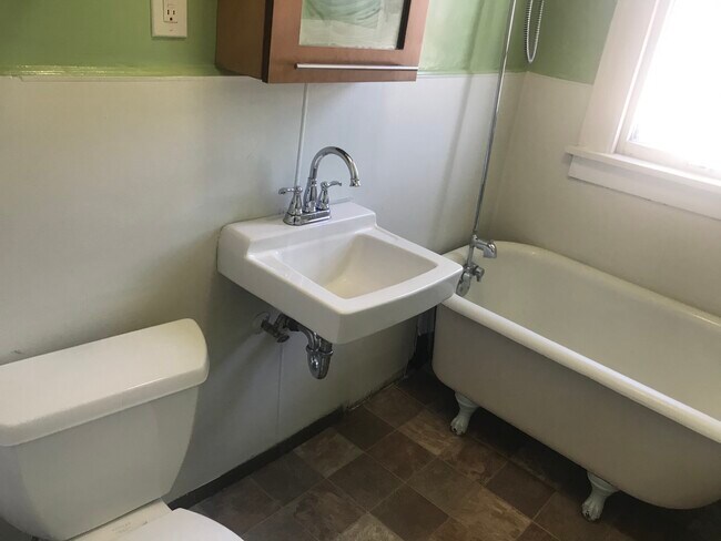 Bathroom with deep vintage clawfoot tub - 2917 S 31st Ave