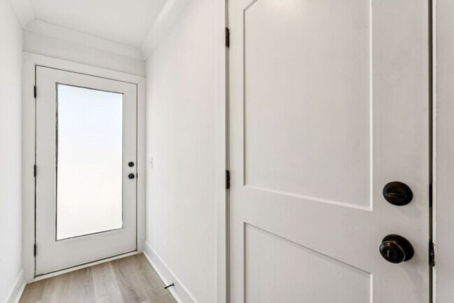 Building Photo - High-End 2BR Townhome | Rooftop Terrace + 2-Car Garage | 24-Unit Community