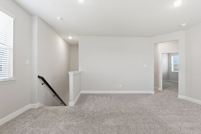 Building Photo - "Open-Concept 4-Bedroom, 2.5-Bath with Designer Finishes and Peaceful Greenbelt Views!"
