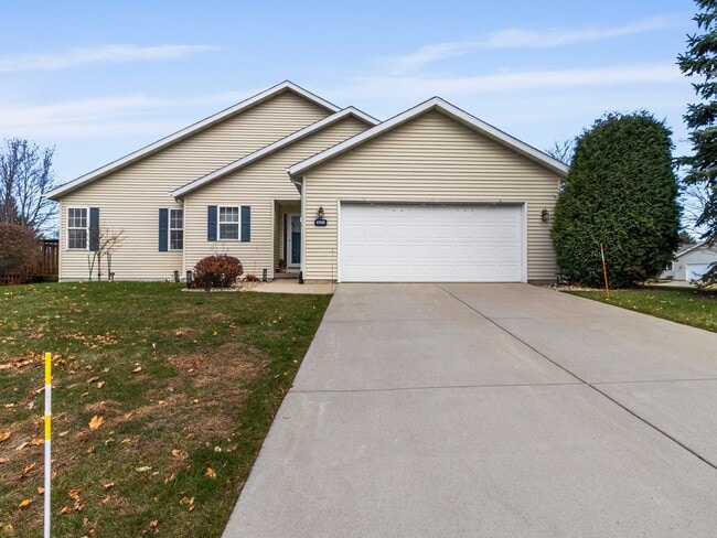 Building Photo - Spacious 3BR/3BA Condo with Finished Basement + 2-Car Garage — Available Now