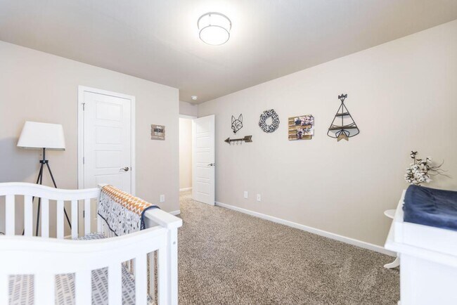 Building Photo - "Spacious 4-Bedroom Home with Granite Coun...
