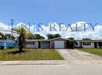 Building Photo - True 3 Bed~2 Bath~with garage. Over 1,000 sq ft, with updated kitchen & bathrooms, large open liv...