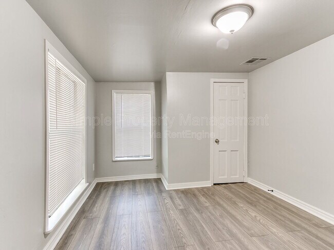 Building Photo - 9706 N Garnett Dr