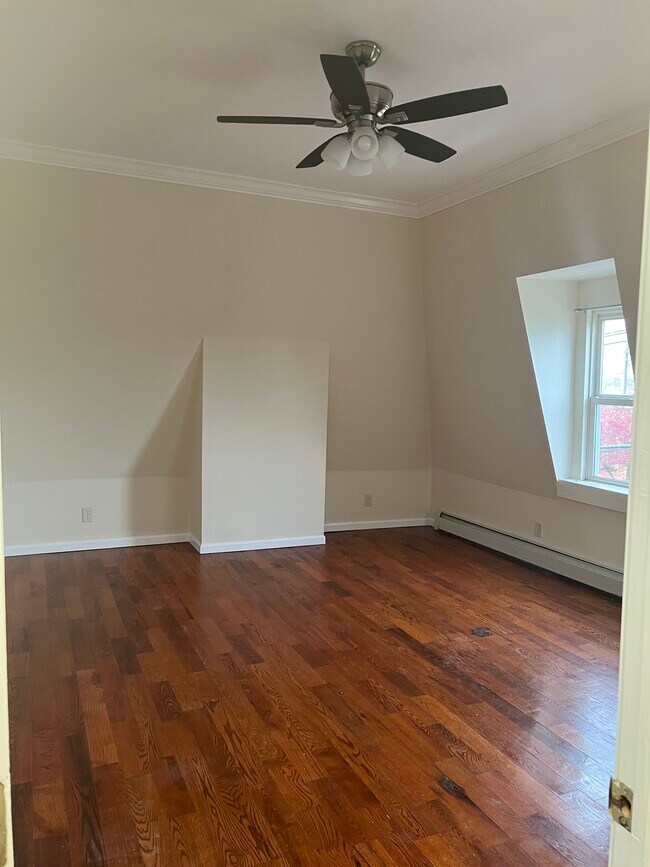 Bedroom 1 in natural day light - 134 S Broadway