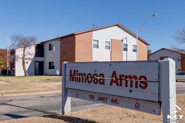 Front Sign - Mimosa Arms