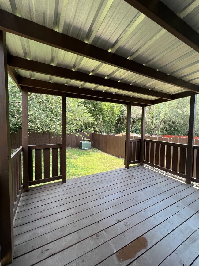 Building Photo - Northeast 3/2 with New Bedroom Floors & Covered Patio